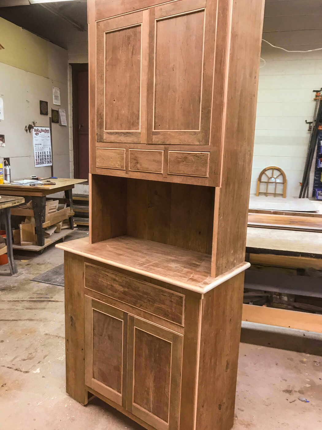 Pantry upper cabinets with raised panel doors