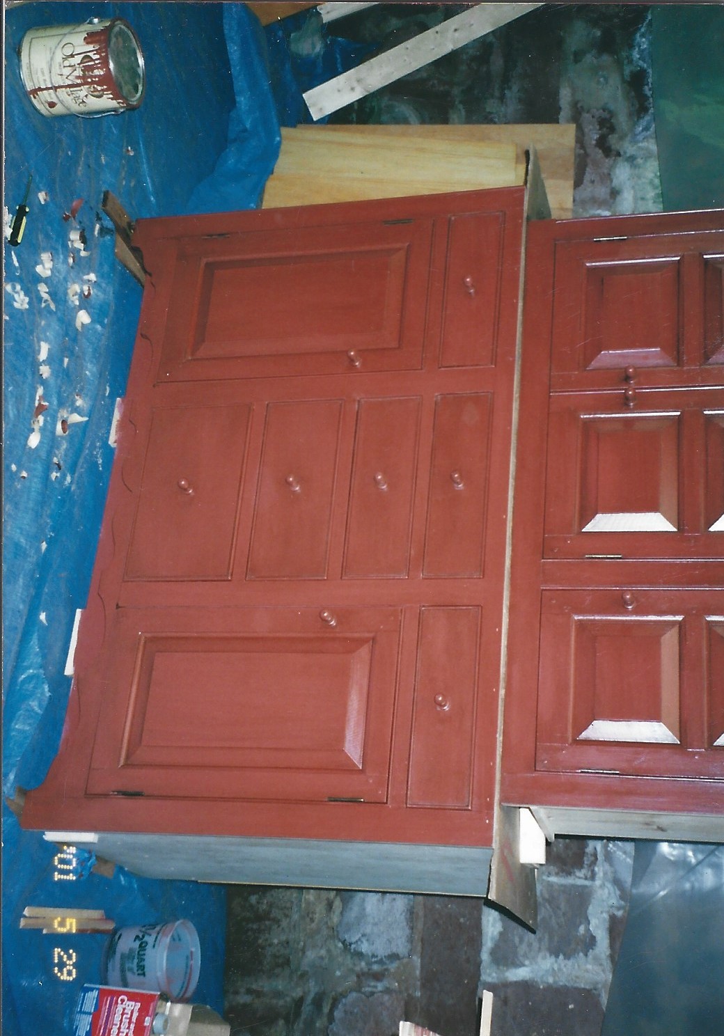 Dark red full hutch with upper glazed doors and lower drawers