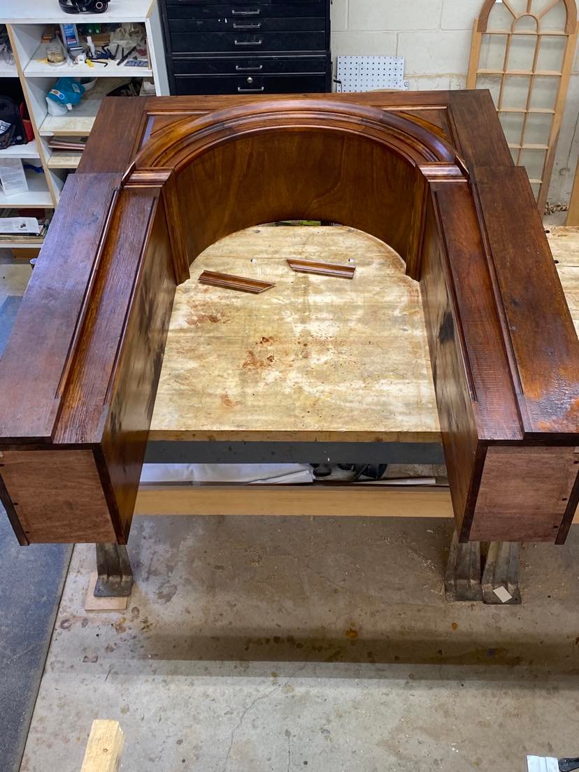 Cabinet with fluted pilasters, shop assembly